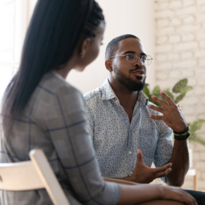 man talking to a group of people