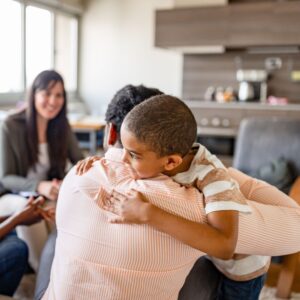 child hugging parent